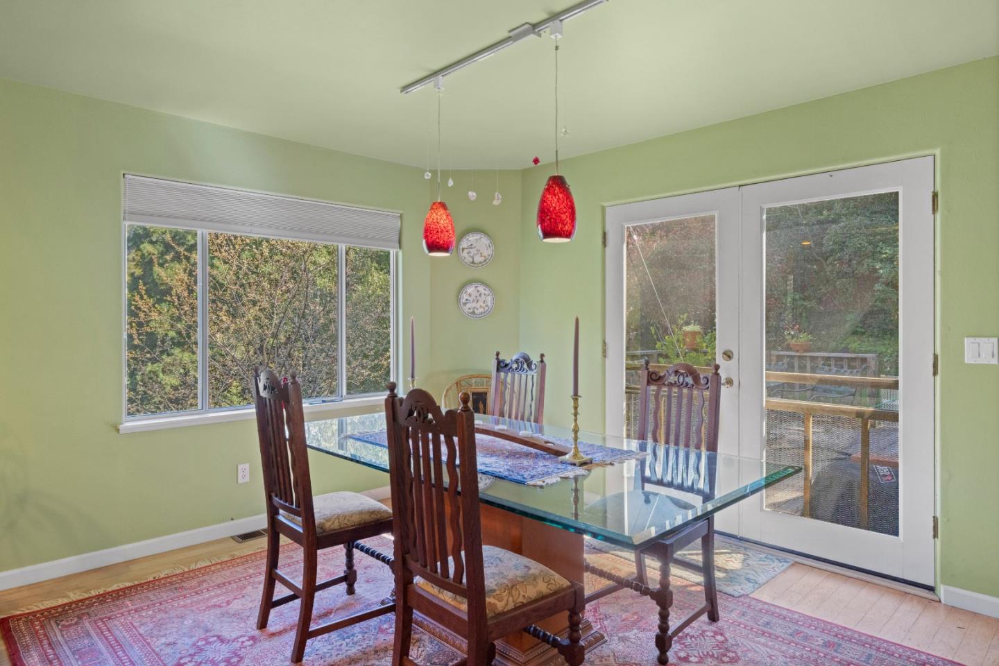 38621 Palo Colorado Road Carmel, CA 93923 - Photo 14 of 32 a view of a dining room with furniture window and wooden floor