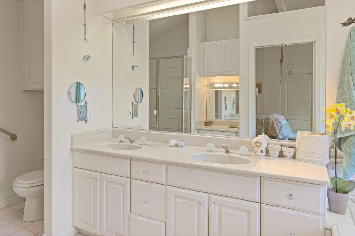 38621 Palo Colorado Road Carmel, CA 93923 - Photo 16 of 32 a bathroom with a sink and a mirror