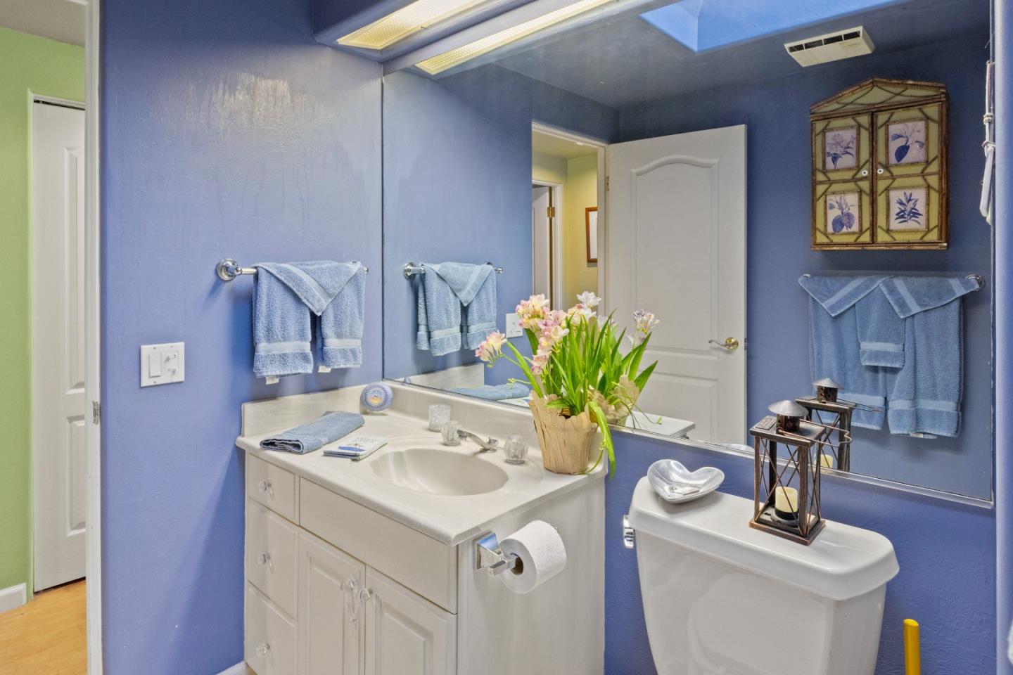 38621 Palo Colorado Road Carmel, CA 93923 - Photo 22 of 32 a bathroom with a sink and a mirror