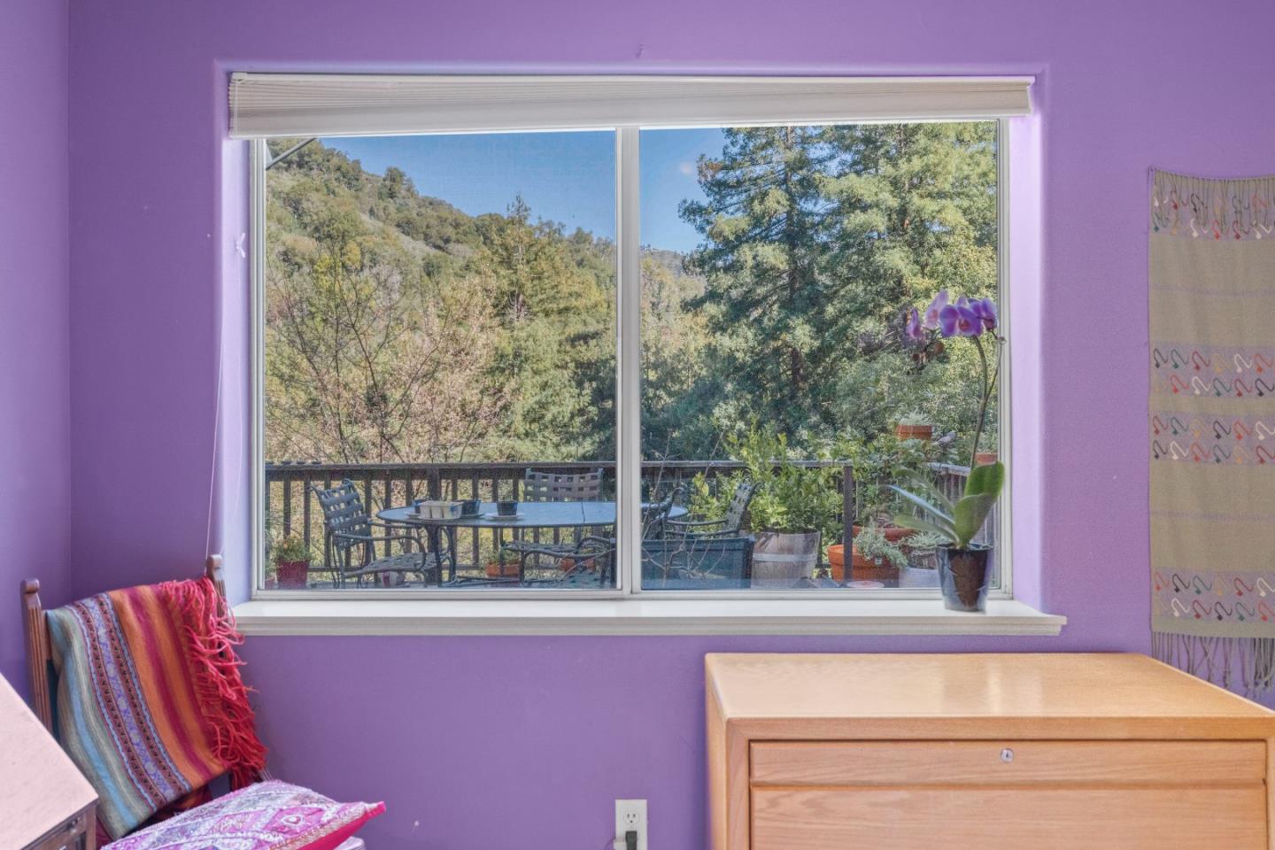 38621 Palo Colorado Road Carmel, CA 93923 - Photo 25 of 32 a view of a room that has a bed and a window