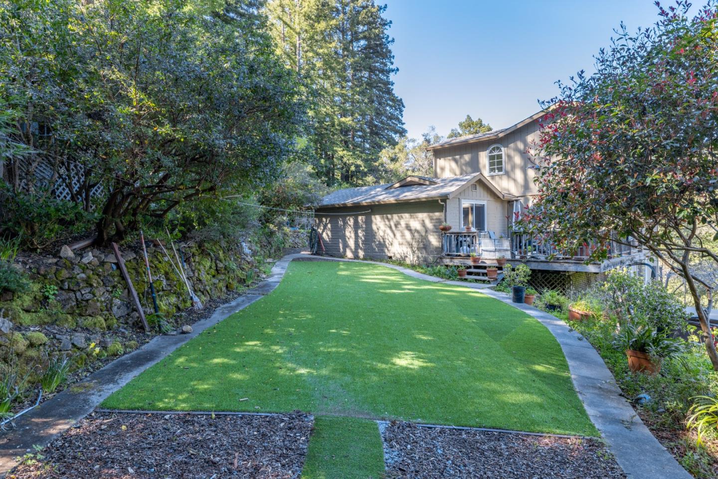 38621 Palo Colorado Road Carmel, CA 93923 - Photo 28 of 32 a view of a house with a yard