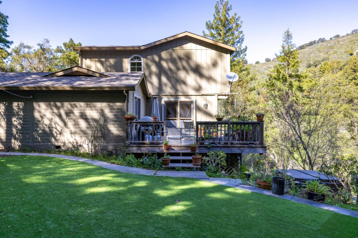 38621 Palo Colorado Road Carmel, CA 93923 - Photo 29 of 32 a view of a house with a yard and plants