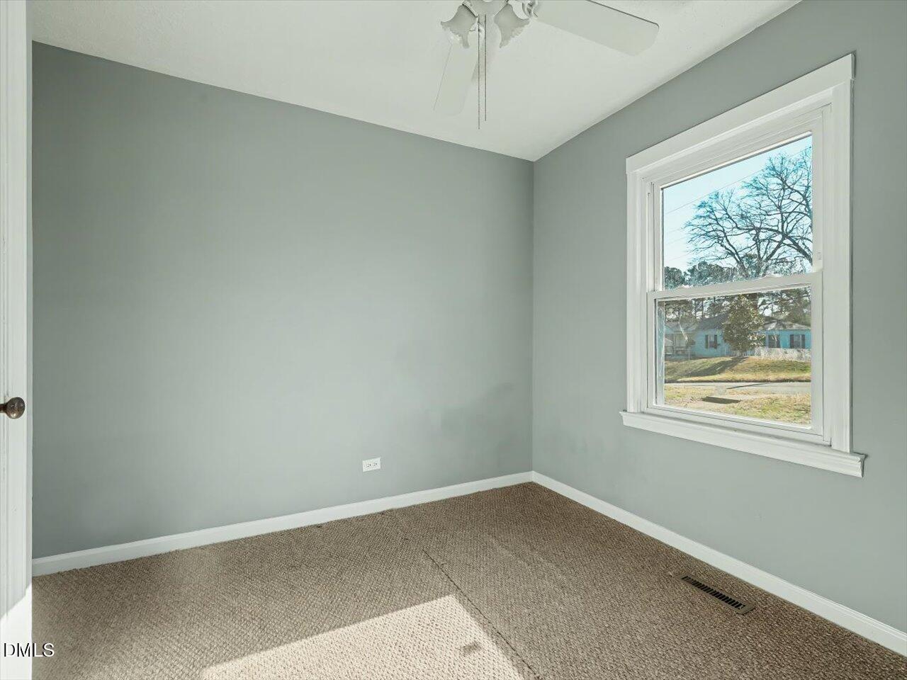 1501 Fairfax Road Durham, NC 27701 - Photo 14 of 42 an empty room with a window