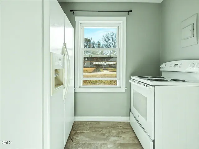 a view of cabinets and wooden floor