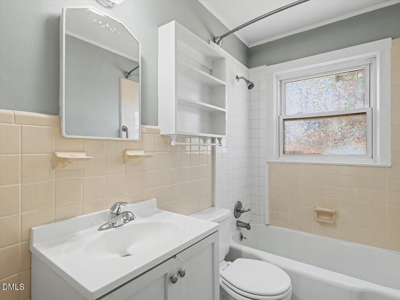 1501 Fairfax Road Durham, NC 27701 - Photo 25 of 42 a bathroom with a sink toilet and vanity