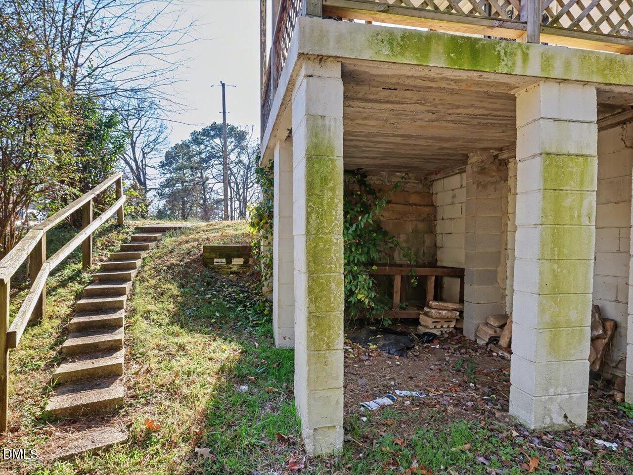 1501 Fairfax Road Durham, NC 27701 - Photo 30 of 42 a view of a porch with chairs and potted plants
