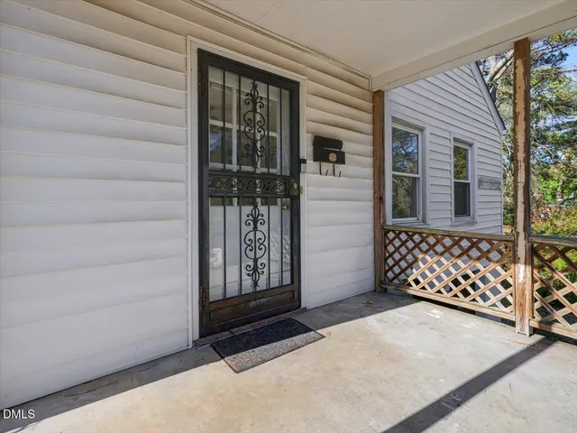 a view of a living room with a ceiling fan
