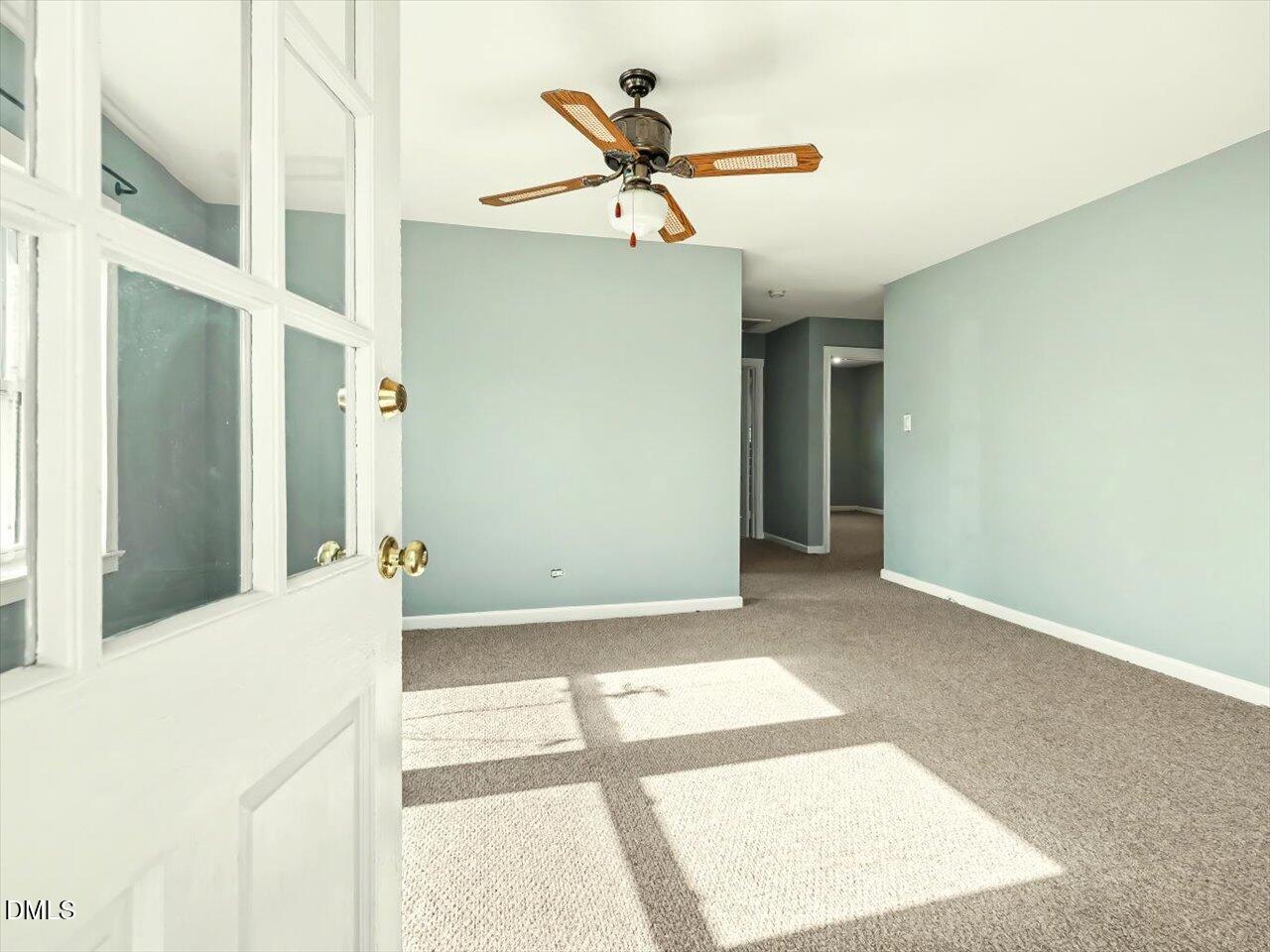 1501 Fairfax Road Durham, NC 27701 - Photo 8 of 42 a view of a living room with a ceiling fan