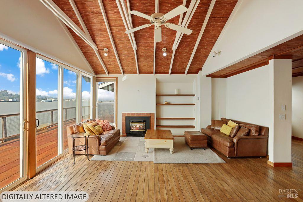 34 Sandy Beach Road Vallejo, CA 94590 - Photo 18 of 63 a living room with furniture and a fireplace