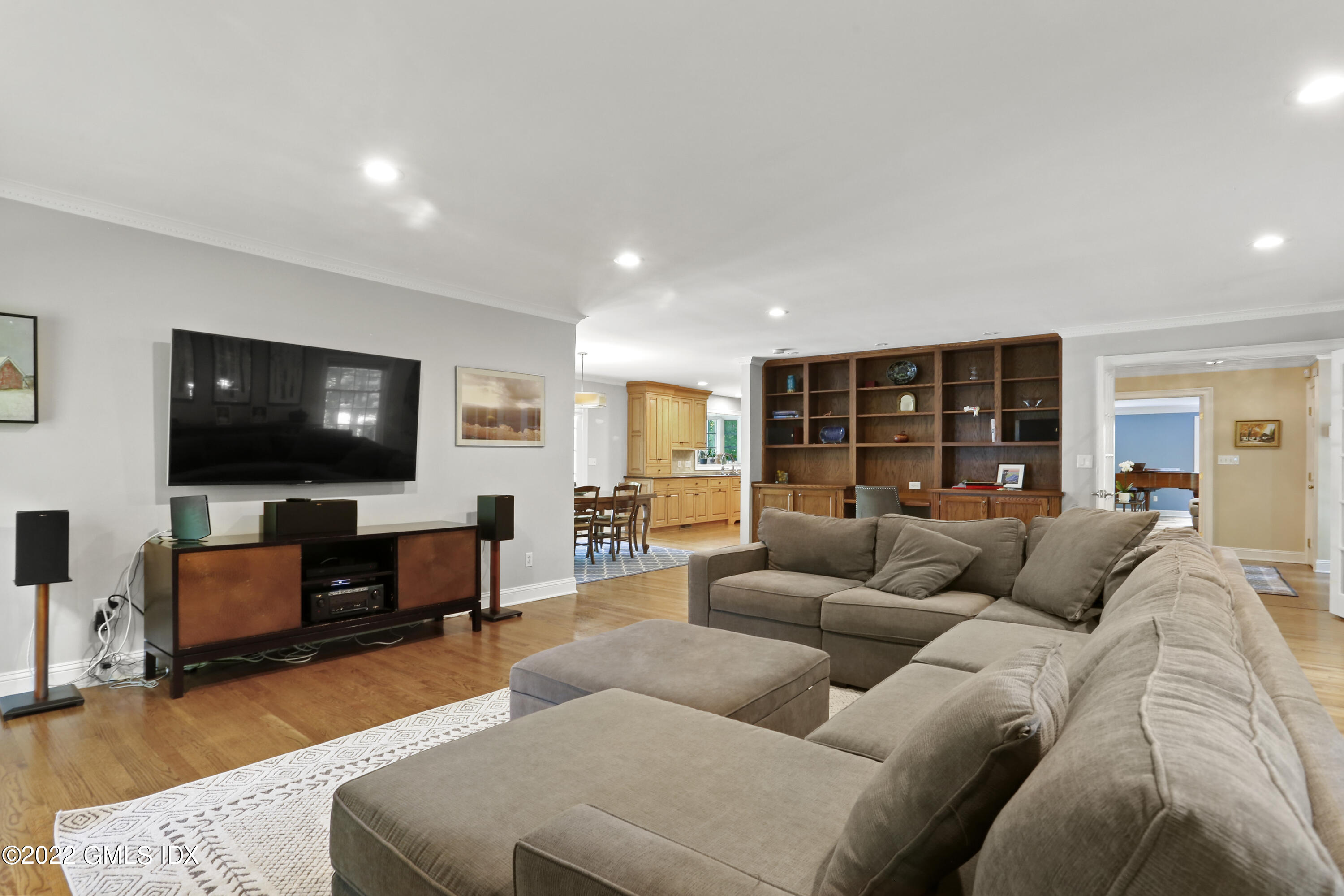 9 Frontier Road Cos Cob, CT 06807 - Photo 15 of 37 a living room with furniture and a flat screen tv