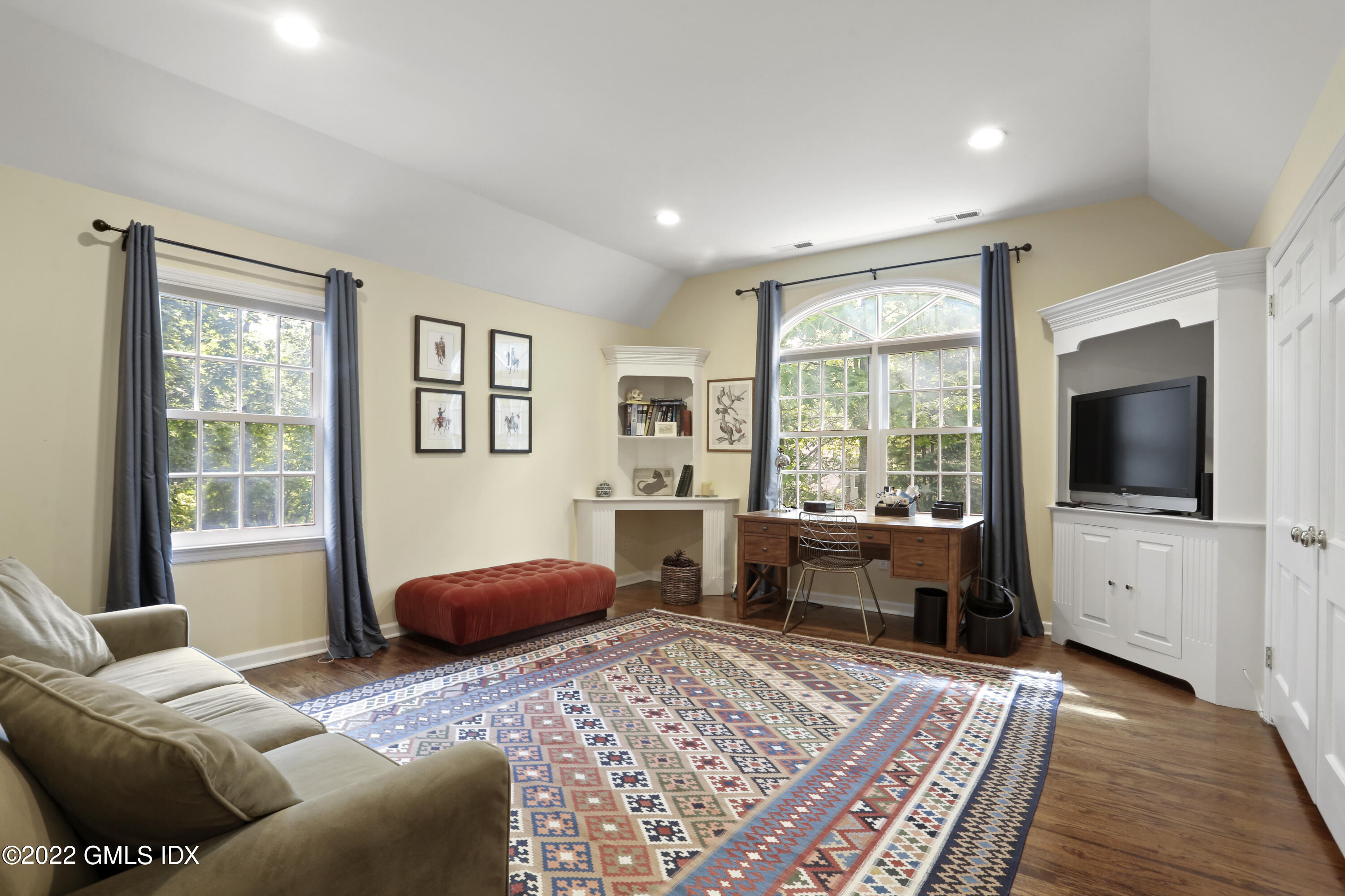 9 Frontier Road Cos Cob, CT 06807 - Photo 21 of 37 a bedroom with furniture and a flat screen tv