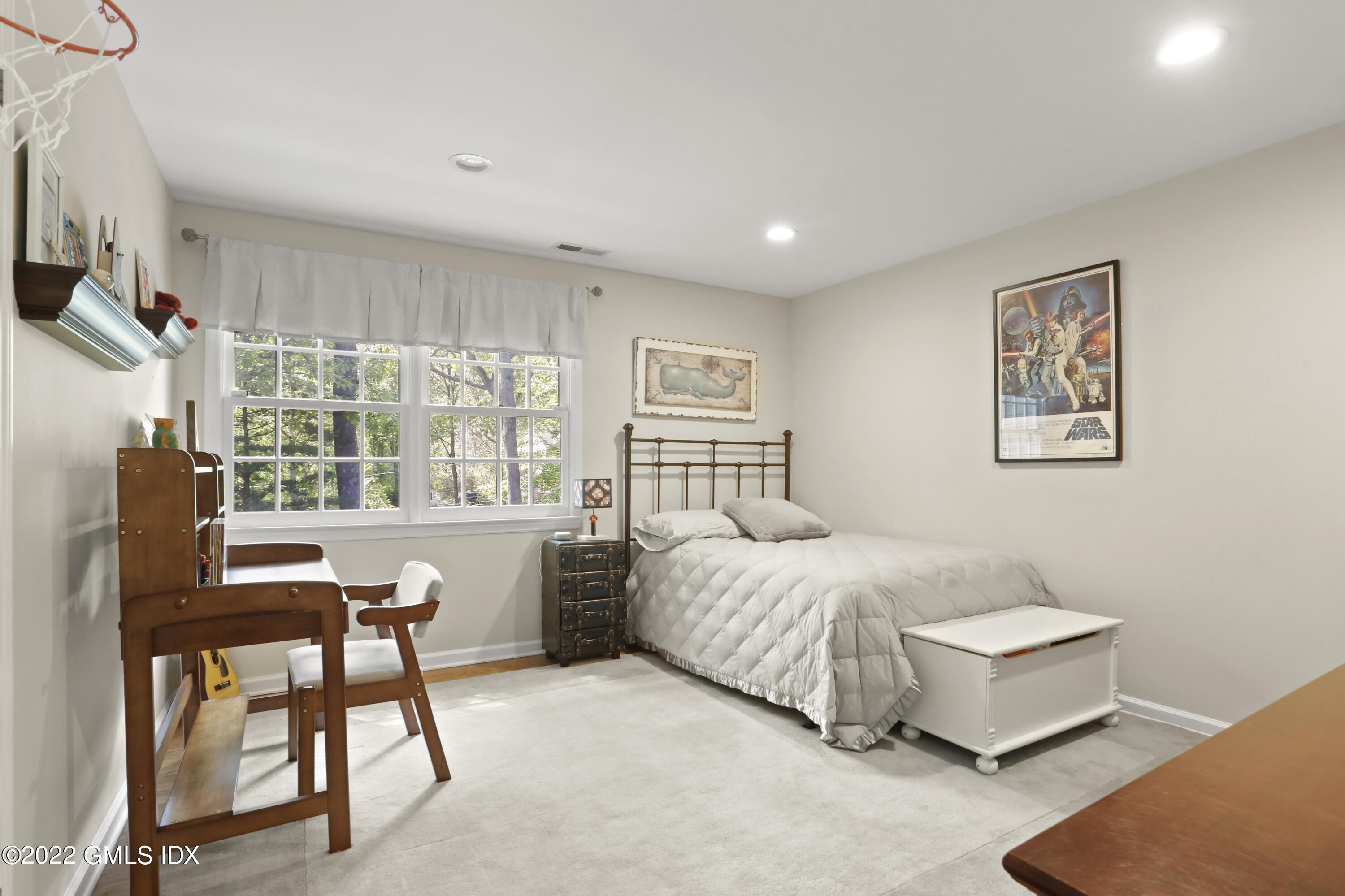 9 Frontier Road Cos Cob, CT 06807 - Photo 22 of 37 a bedroom with a bed and a large window