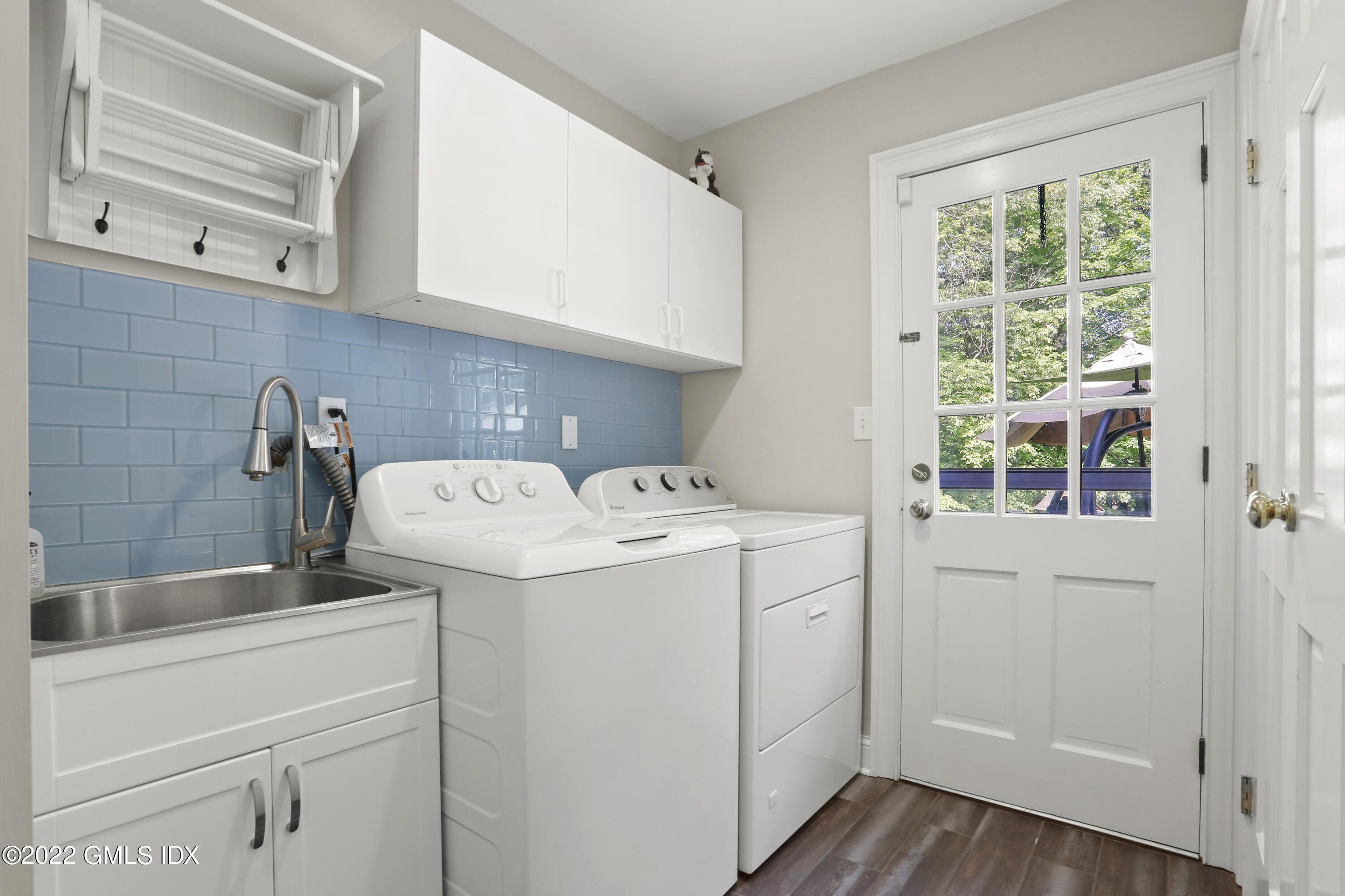 9 Frontier Road Cos Cob, CT 06807 - Photo 25 of 37 a utility room with dryer and washer