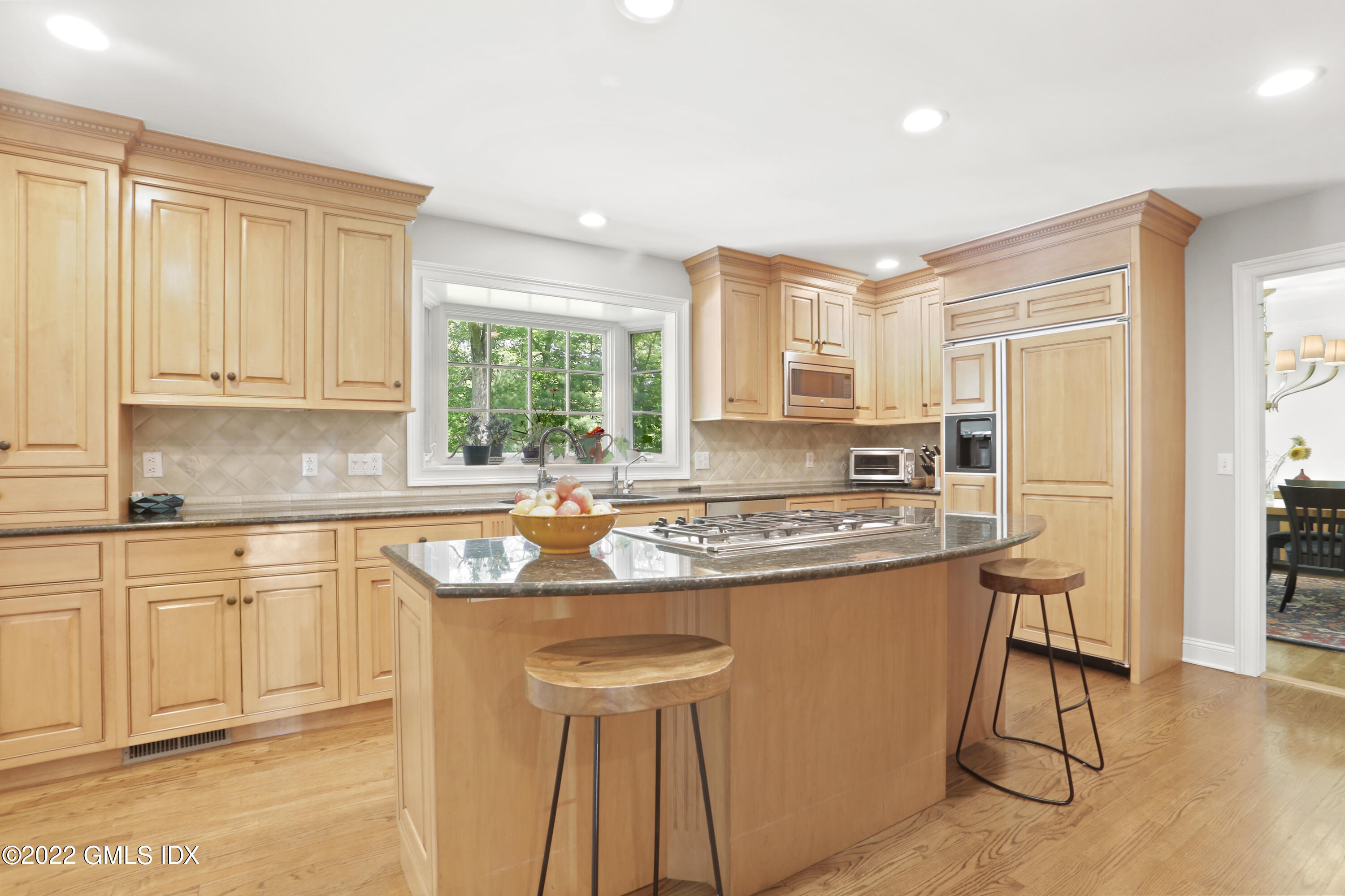 9 Frontier Road Cos Cob, CT 06807 - Photo 10 of 37 a kitchen with stainless steel appliances granite countertop a stove a sink and a refrigerator