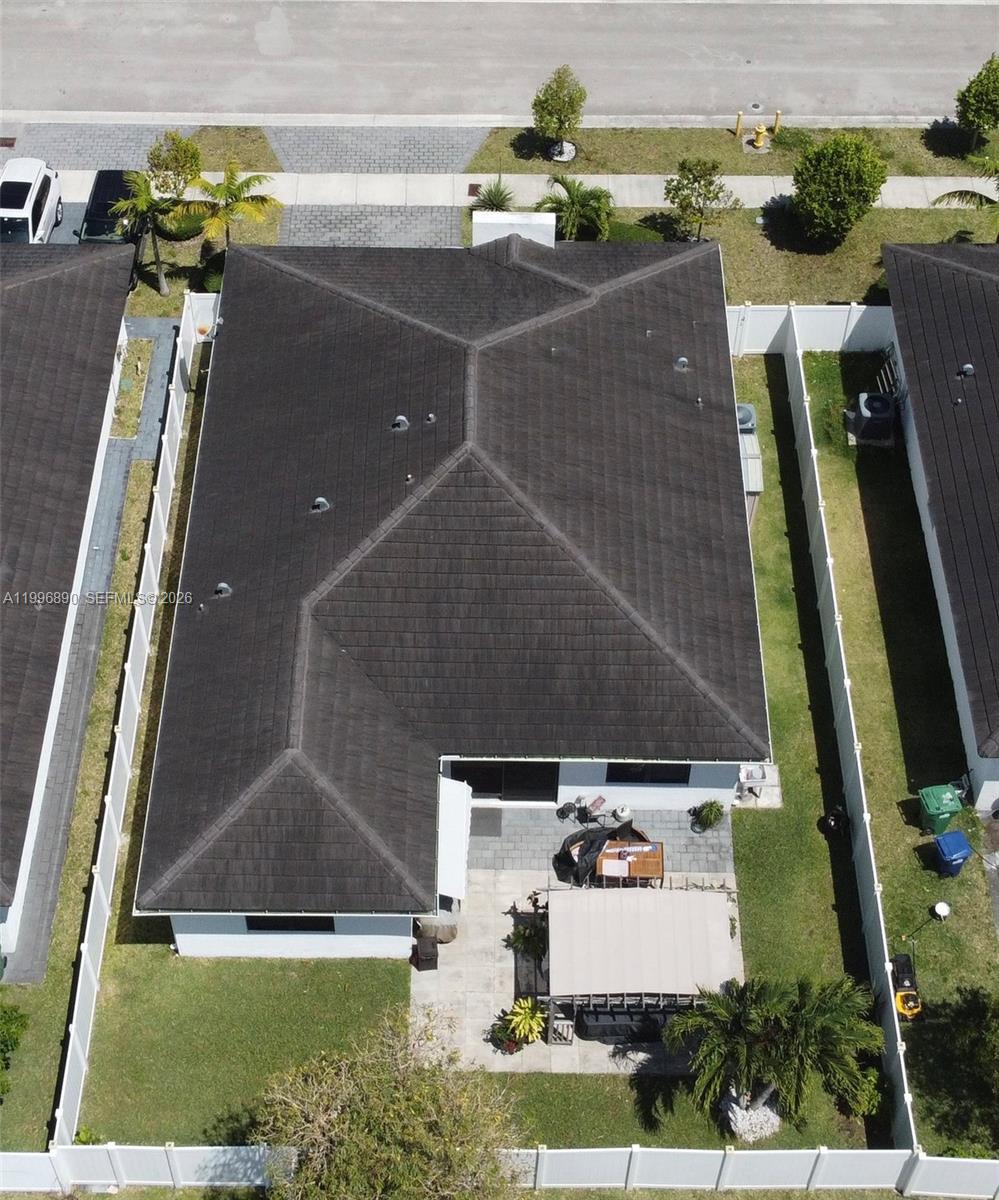 23552 Southwest 107th Place Homestead, FL 33032 - Photo 10 of 30 an aerial view of a house with a yard swimming pool and outdoor seating