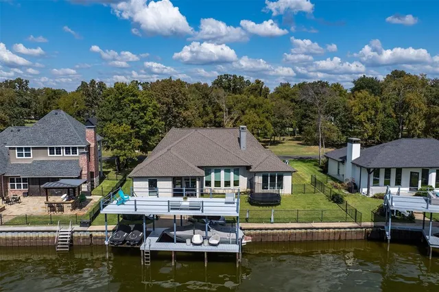 a house with river in front of it