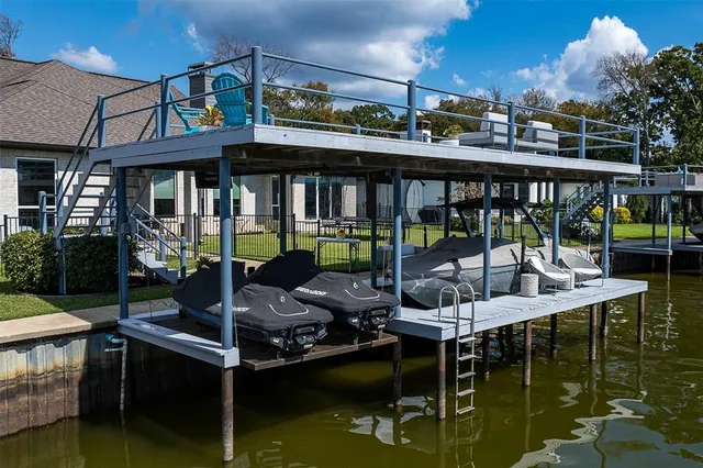 a view of a swimming pool with outdoor seating