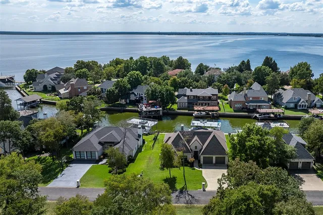 an aerial view of a house with garden space sitting space and swimming pool