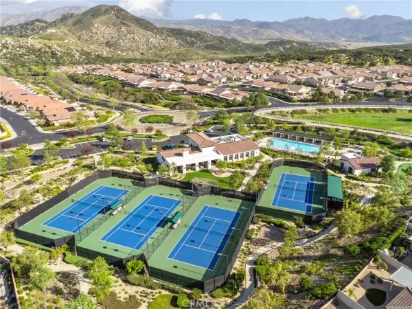 an aerial view of a house with a garden