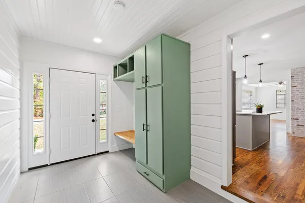 a view of a bathroom with a shower and a tub
