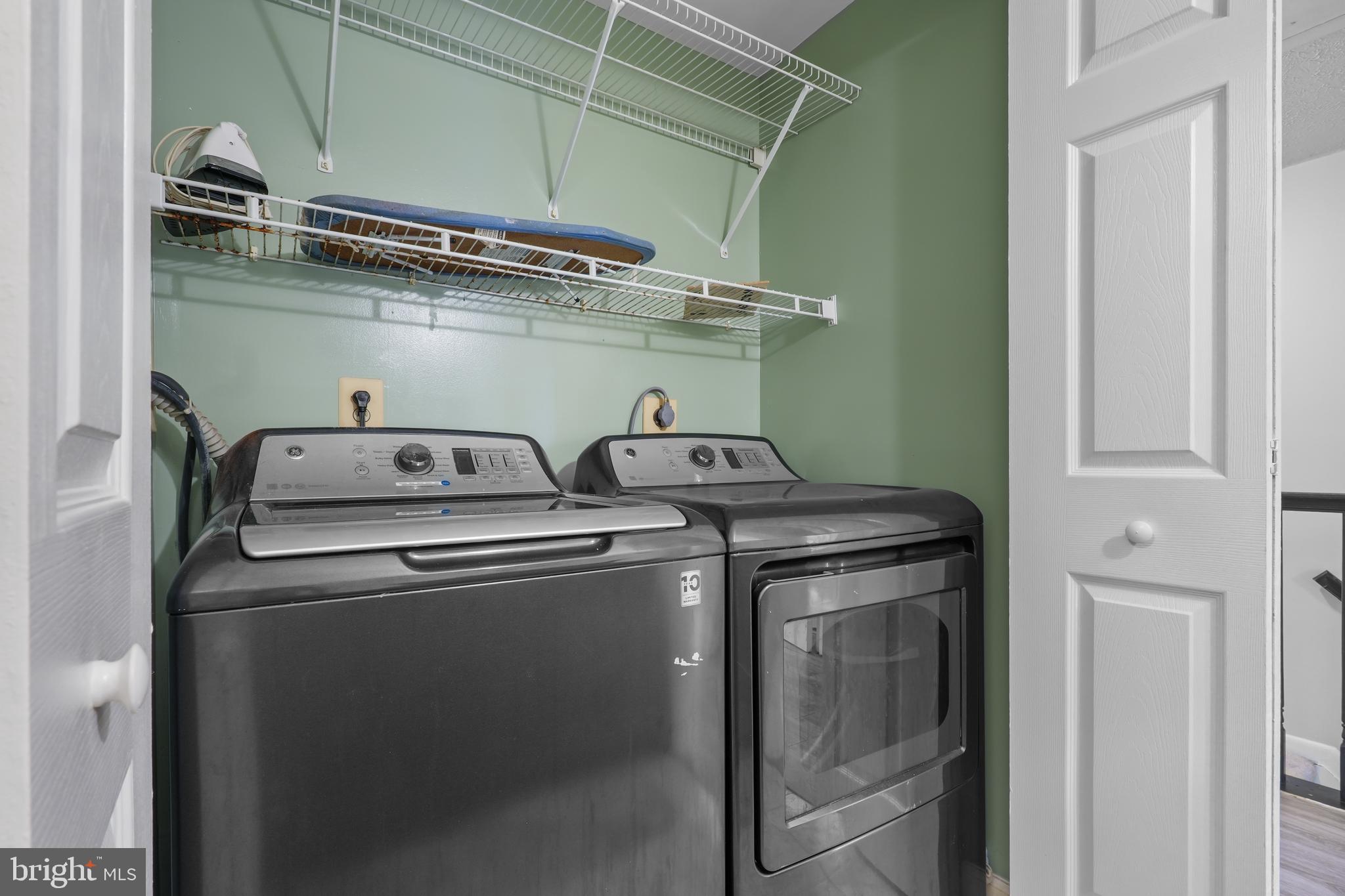 8729 Ritchboro Road District Heights, MD 20747 - Photo 15 of 22 a utility room with dryer and washer