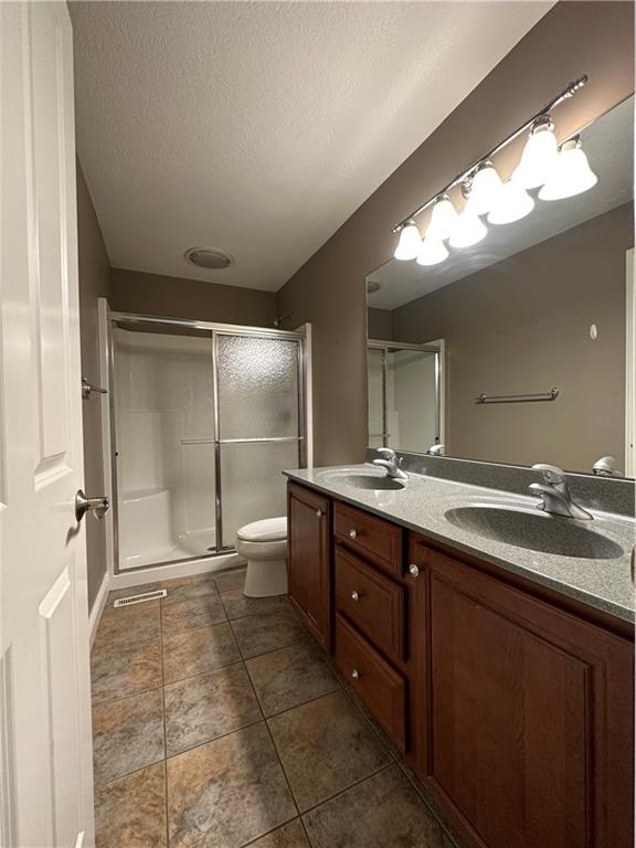 235 Stoup Road Mars, PA 16046 - Photo 36 of 50 a bathroom with a double vanity sink and a mirror