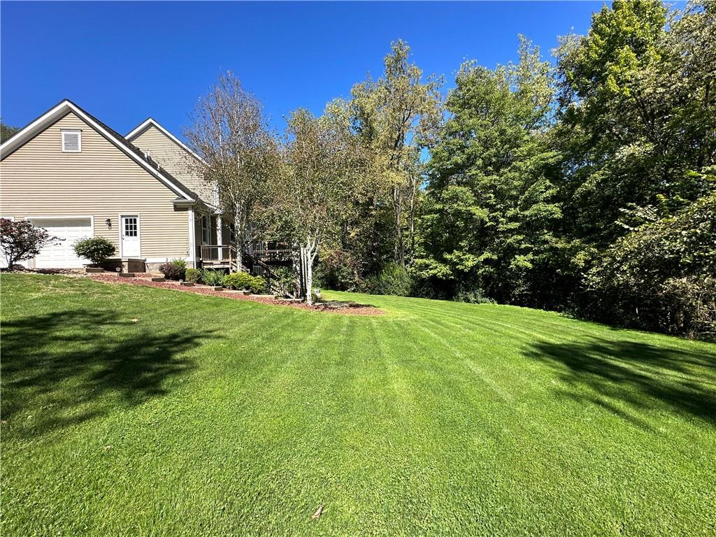 235 Stoup Road Mars, PA 16046 - Photo 49 of 50 a view of a house with a yard