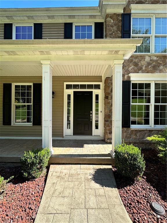 235 Stoup Road Mars, PA 16046 - Photo 5 of 50 a view of a building with potted plants