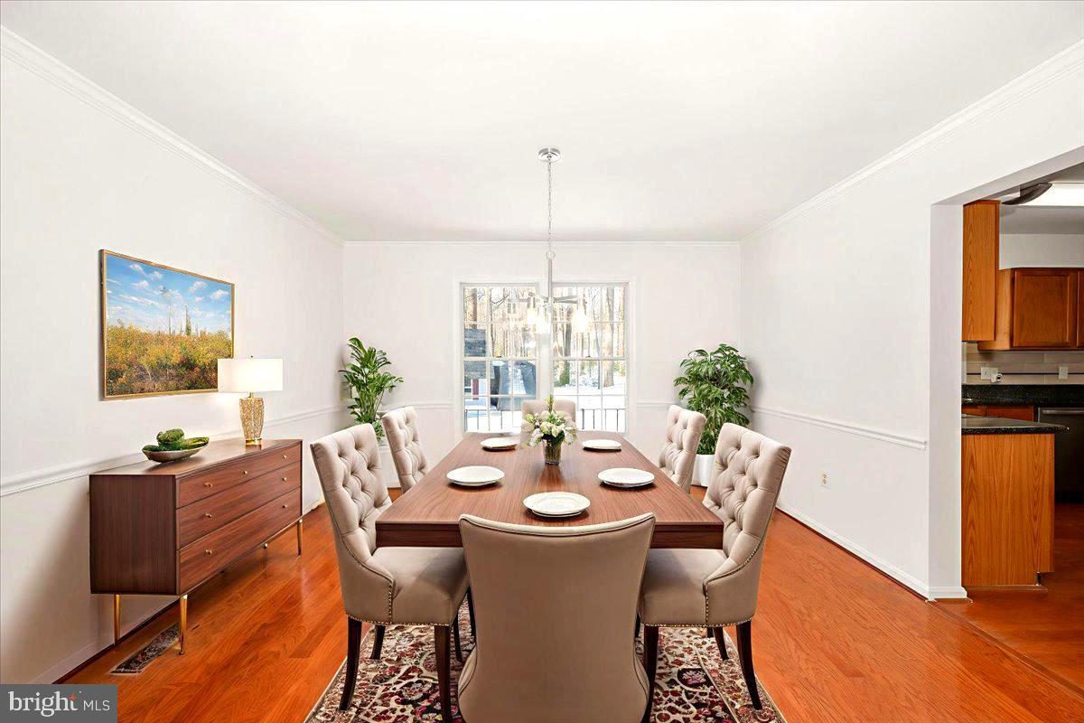 1404 Partridge Lane Bowie, MD 20721 - Photo 26 of 78 a view of a dining room with furniture window and outside view