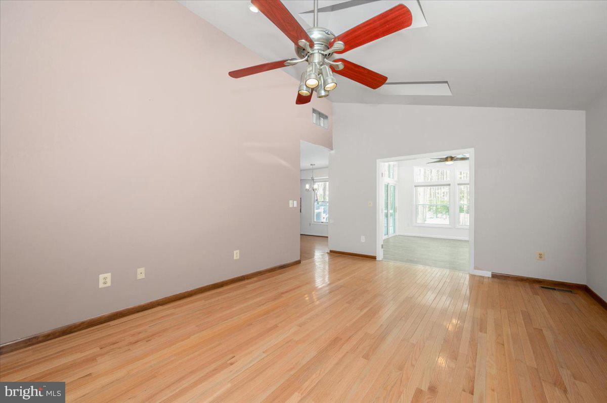 1404 Partridge Lane Bowie, MD 20721 - Photo 40 of 78 wooden floor in an empty room with a window