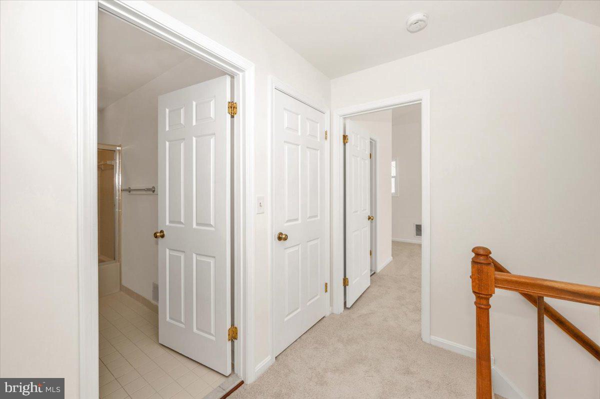 1404 Partridge Lane Bowie, MD 20721 - Photo 43 of 78 a view of a hallway with closet and a bathroom
