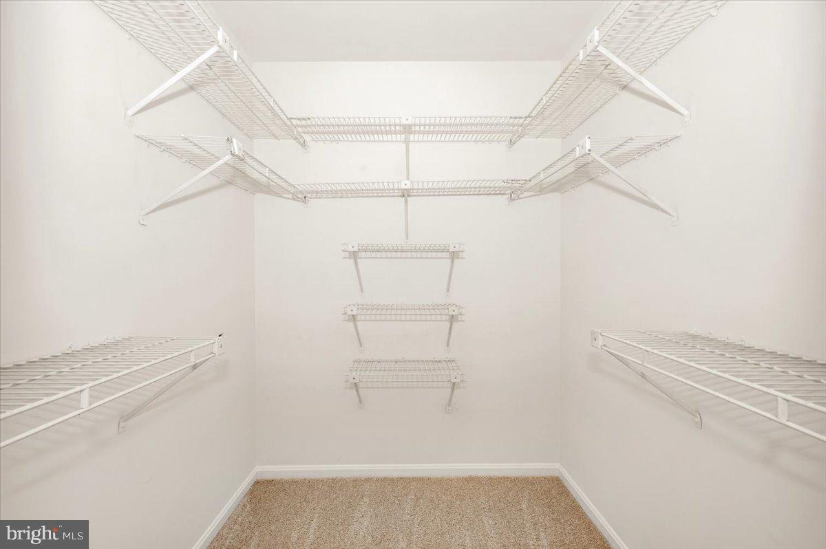 1404 Partridge Lane Bowie, MD 20721 - Photo 46 of 78 a view of walk in closet with empty racks