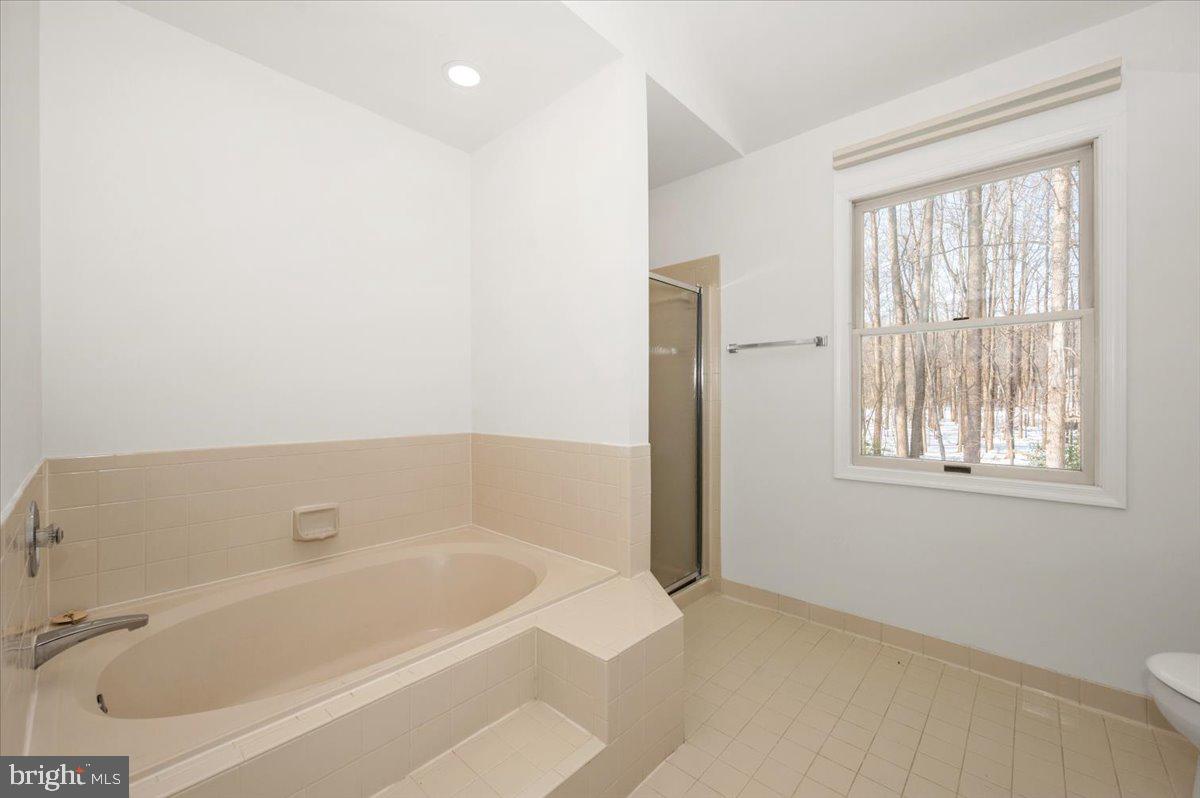 1404 Partridge Lane Bowie, MD 20721 - Photo 49 of 78 a white bath tub sitting next to a window