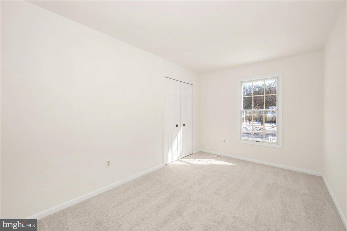 1404 Partridge Lane Bowie, MD 20721 - Photo 51 of 78 a view of an empty room with a window