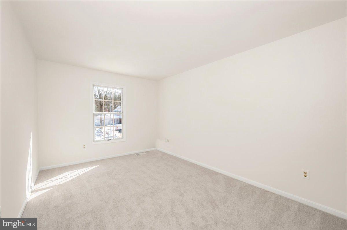1404 Partridge Lane Bowie, MD 20721 - Photo 55 of 78 a view of an empty room with a window