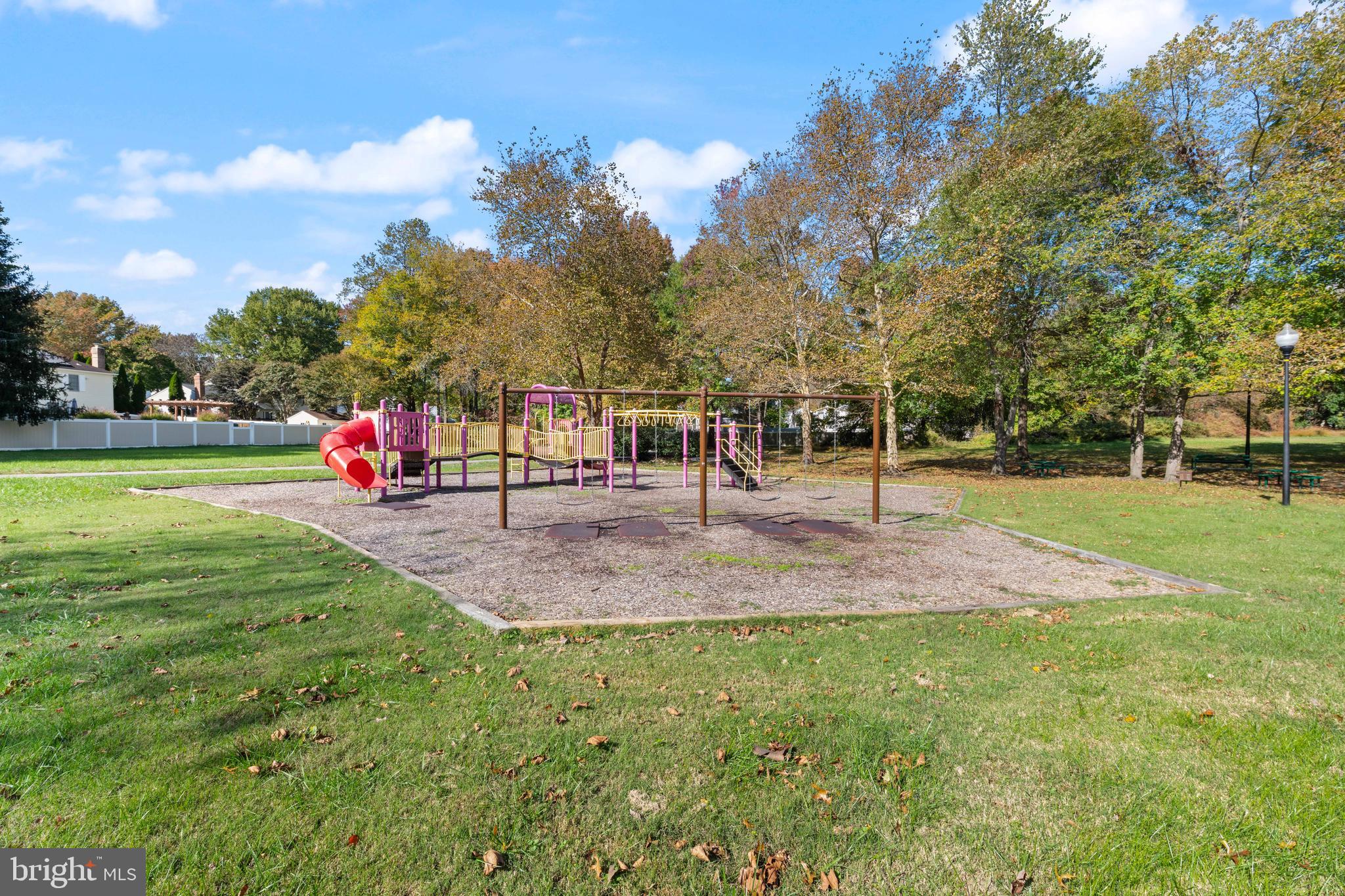 1404 Partridge Lane Bowie, MD 20721 - Photo 75 of 78 a view of a park with swings and slides