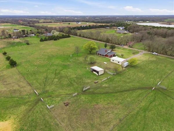 a view of a lake in middle of the town
