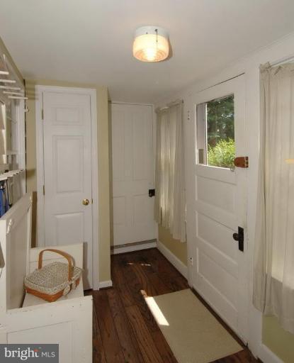 202 Edwards Ferry Road Northeast Leesburg, VA 20176 - Photo 25 of 28 MUD ROOM W/BACK STAIRCASE TO UPPER LEVEL