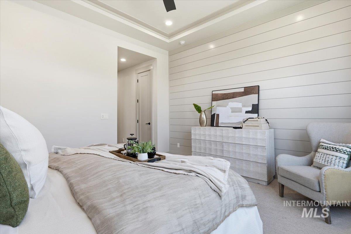 6762 South Messner Way Meridian, ID 83642 - Photo 15 of 35 Bedroom with a tray ceiling and recessed lighting