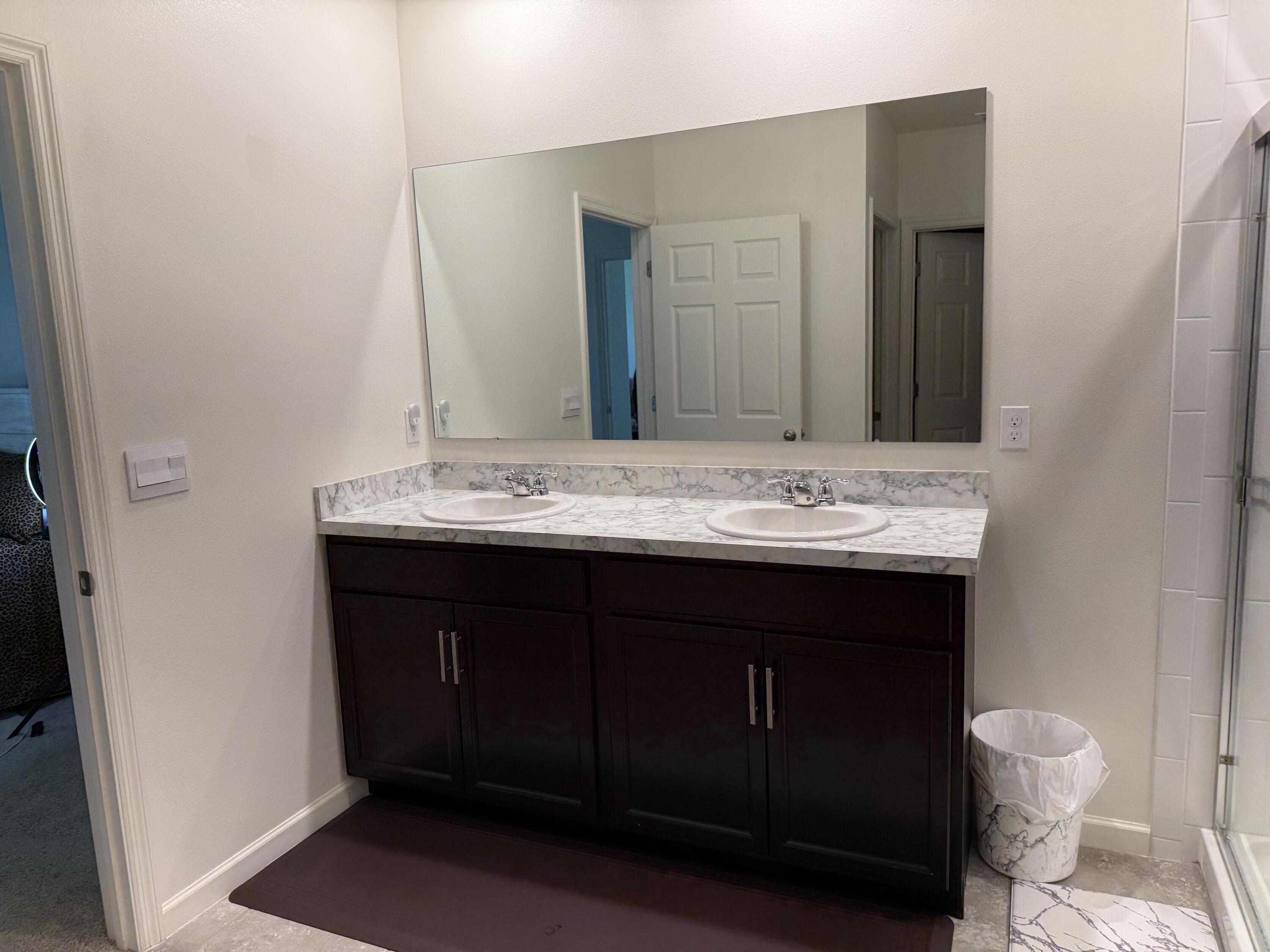 9511 Potomac Drive Fort Pierce, FL 34945 - Photo 19 of 26 a bathroom with a sink and a toilet