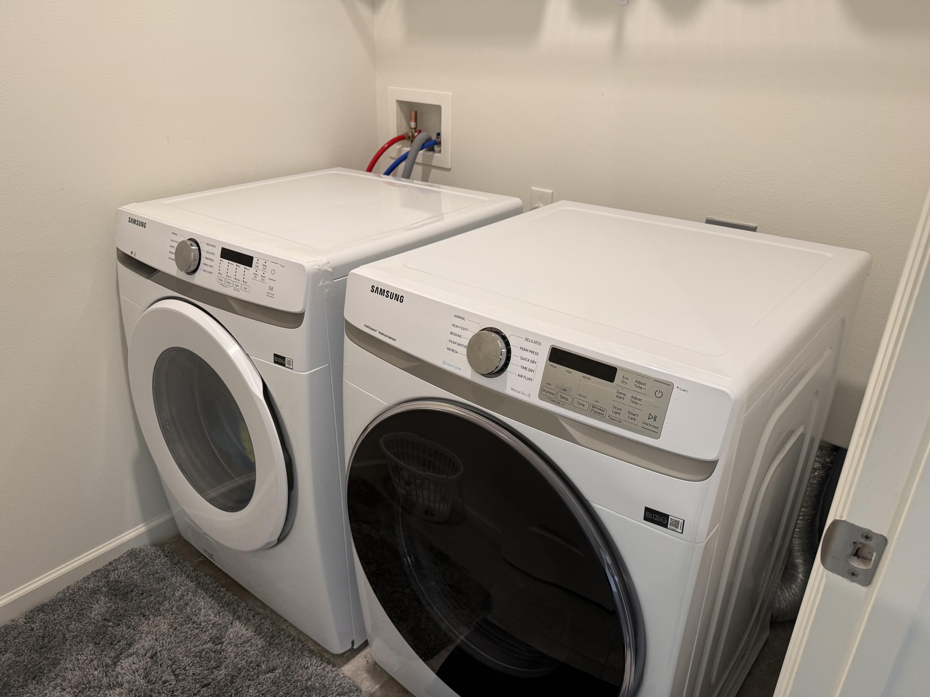 9511 Potomac Drive Fort Pierce, FL 34945 - Photo 5 of 26 a utility room with dryer and washer