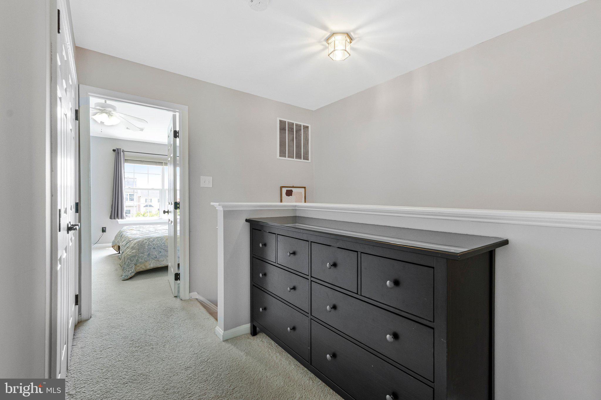 590 Tuliptree Square Northeast Leesburg, VA 20176 - Photo 25 of 54 a bathroom with a sink vanity and a mirror