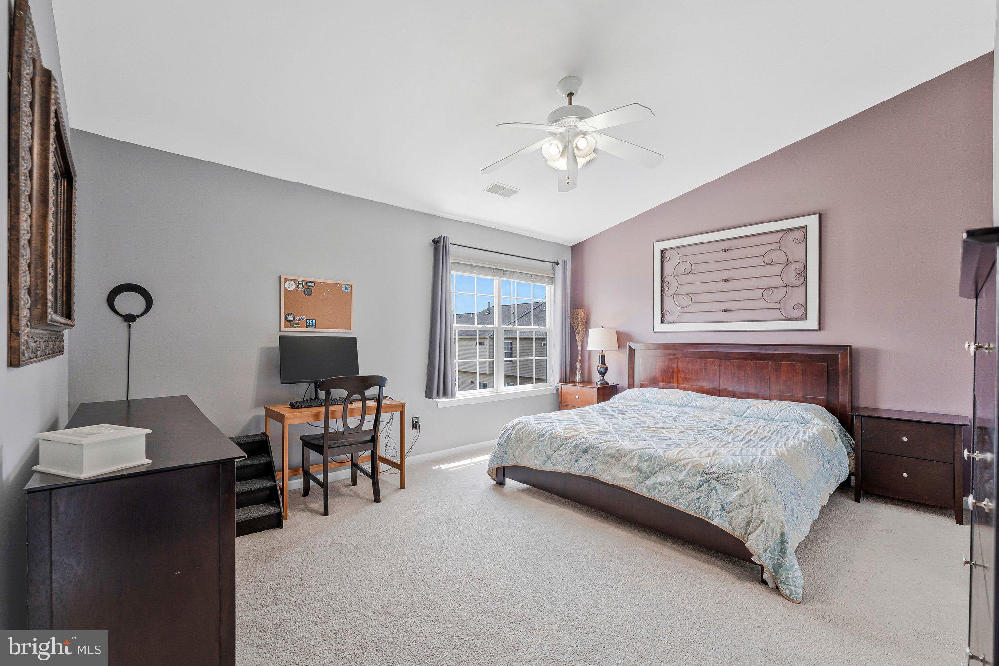 590 Tuliptree Square Northeast Leesburg, VA 20176 - Photo 31 of 54 a bedroom with a bed furniture and a window
