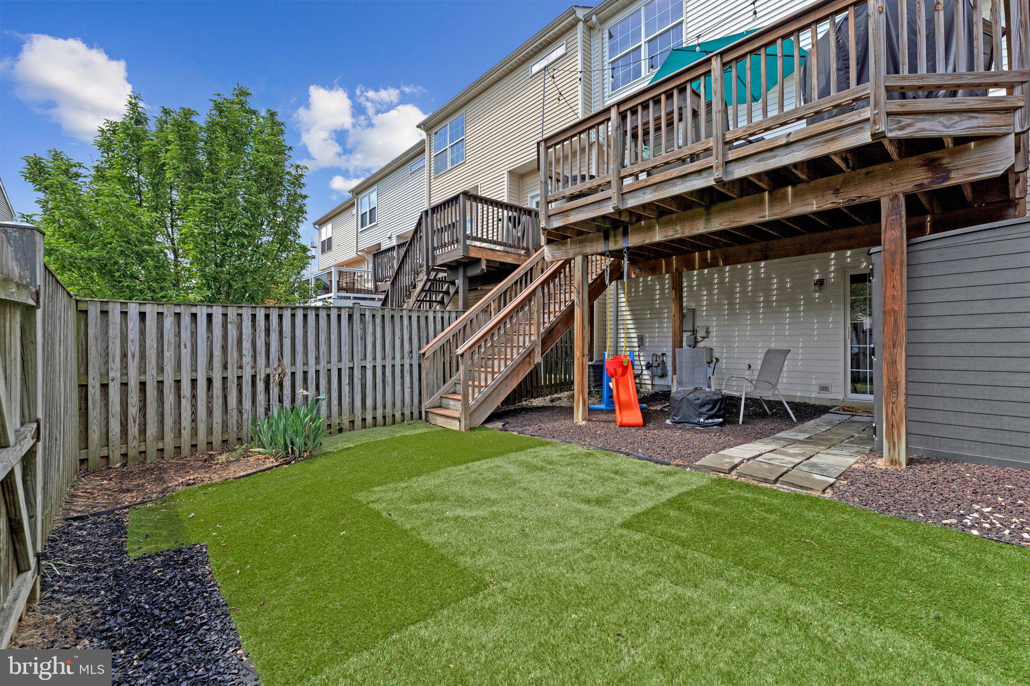590 Tuliptree Square Northeast Leesburg, VA 20176 - Photo 43 of 54 a view of a house with backyard and porch