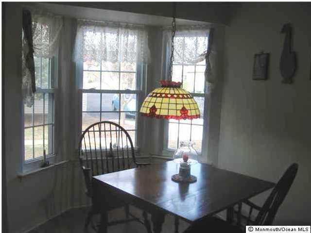 14 Alpine Road, Unit B Manchester Township, NJ 08759 - Photo 3 of 3 a view of a dining room with furniture and window