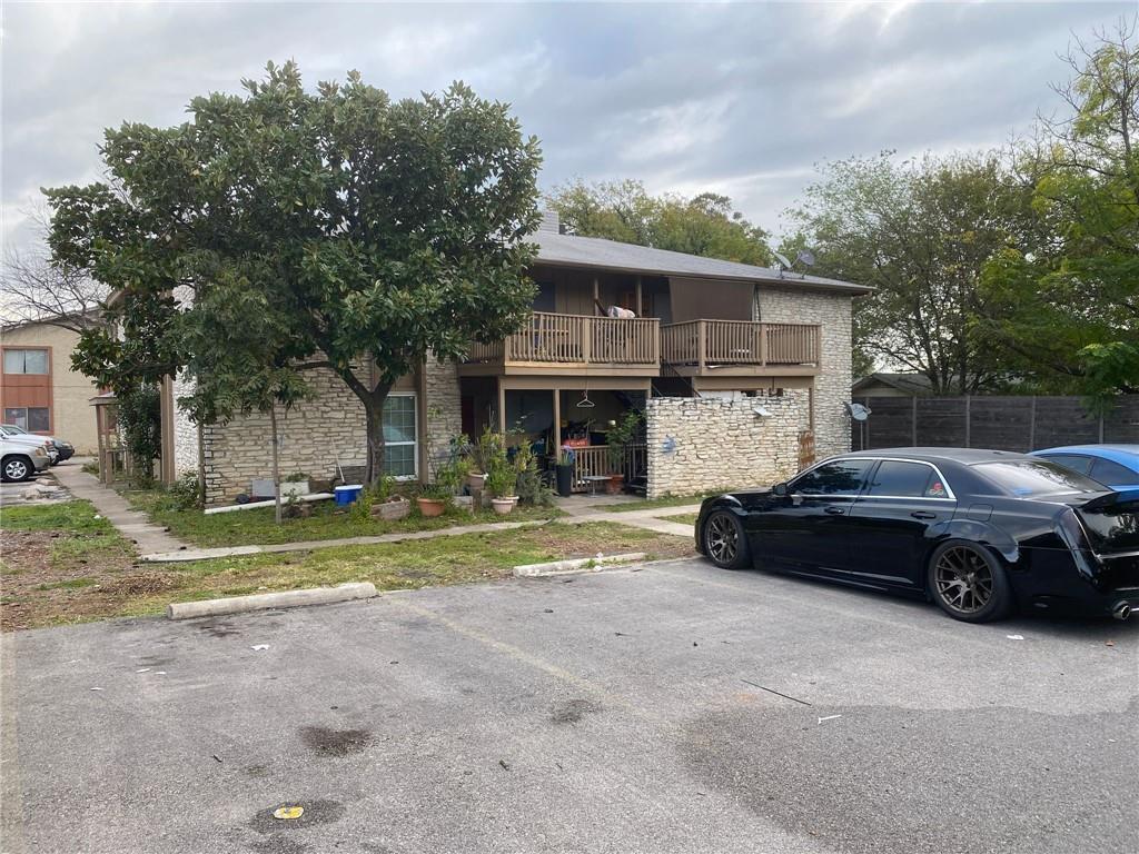 a car parked in front of a house