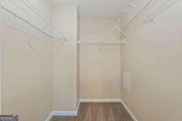 a view of small space with racks on the wall