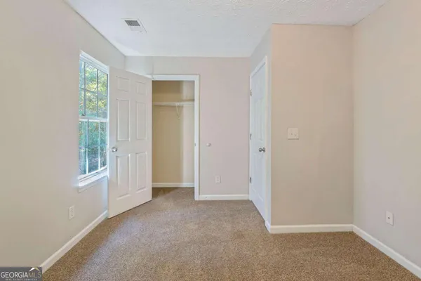 an empty room with windows