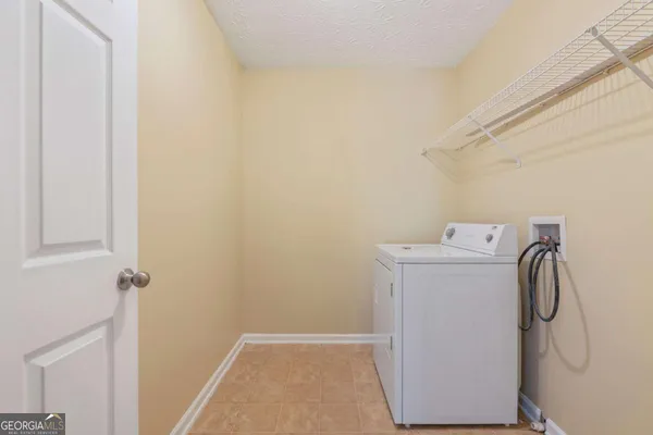 a utility room with a sink