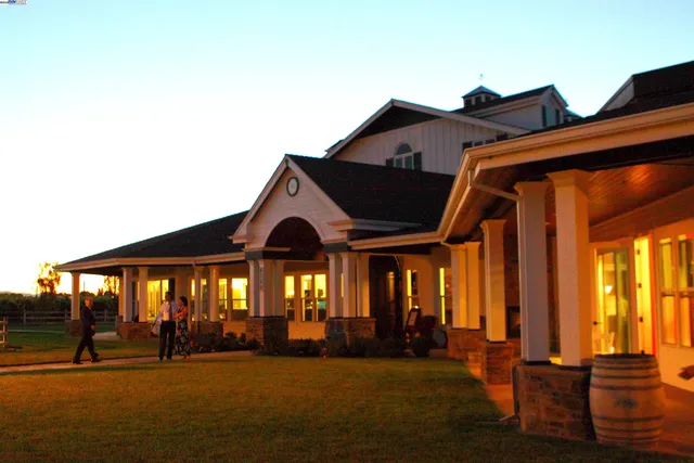 a view of front door and deck of furniture